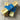 Three yak dog chews with blue labels on a wooden surface